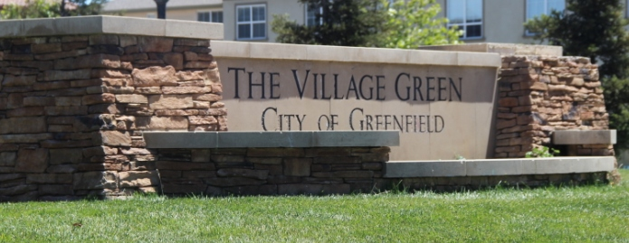 A large stone sign that reads 
